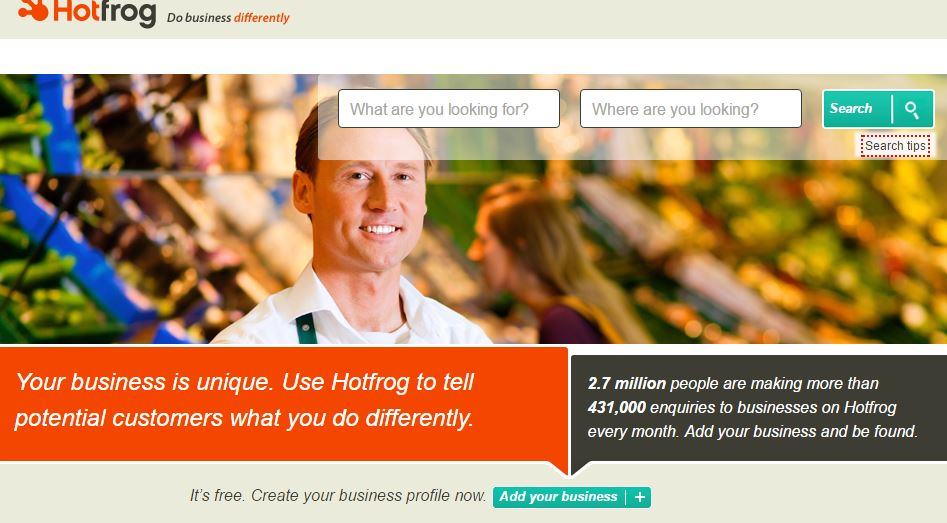 Hotfrog business directory homepage promoting 2.7 million monthly enquiries with a smiling shopkeeper hero image